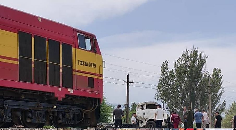 Locomotive rams truck at railroad crossing in Kara-Balta